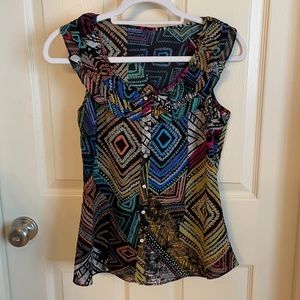 Multi-pattern sleeveless blouse